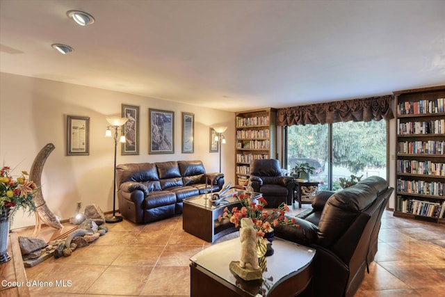 2885 S Folsom Ridge Rd, Coeur Dalene, ID 83814 - living room with light tile patterned floors and built in features