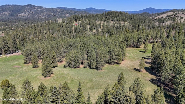 2885 S Folsom Ridge Rd, Coeur Dalene, ID 83814 - drone / aerial view of a mountainous background and a heavily wooded area