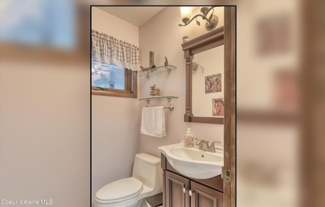 2885 S Folsom Ridge Rd, Coeur Dalene, ID 83814 - half bathroom with vanity and toilet
