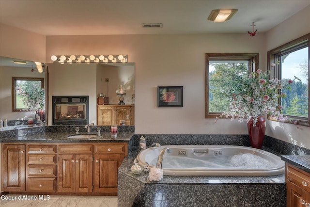 2885 S Folsom Ridge Rd, Coeur Dalene, ID 83814 - full bath featuring vanity, healthy amount of natural light, and a bath