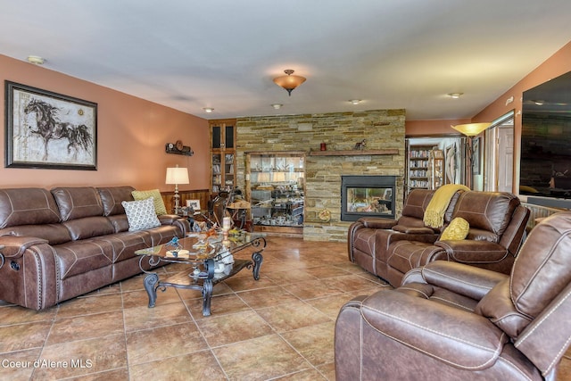 2885 S Folsom Ridge Rd, Coeur Dalene, ID 83814 - living area featuring tile patterned floors and a stone fireplace