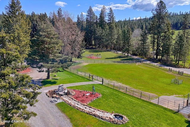 2885 S Folsom Ridge Rd, Coeur Dalene, ID 83814 - view of property's community with a view of countryside, curved driveway, and a view of trees