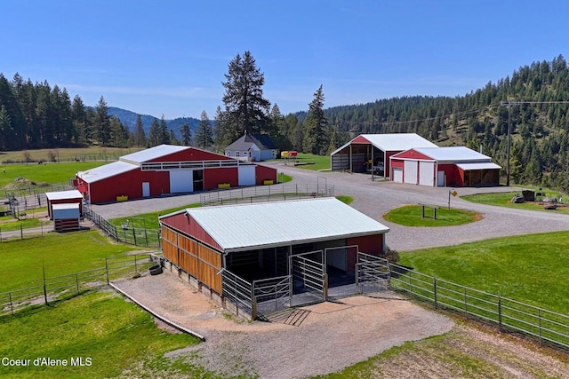 2885 S Folsom Ridge Rd, Coeur Dalene, ID 83814 - overview of rural landscape featuring a heavily wooded area and a mountain backdrop