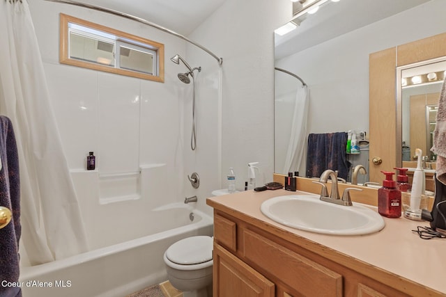 full bath with toilet, shower / bath combo, and vanity