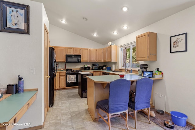kitchen featuring a sink, a breakfast bar area, a peninsula, lofted ceiling, and black appliances