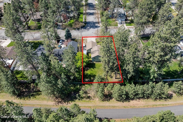 birds eye view of property with a residential view