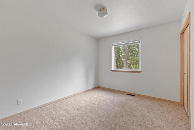 3868 N Palmer Dr, Coeur Dalene, ID 83815 - unfurnished bedroom featuring carpet flooring and baseboards