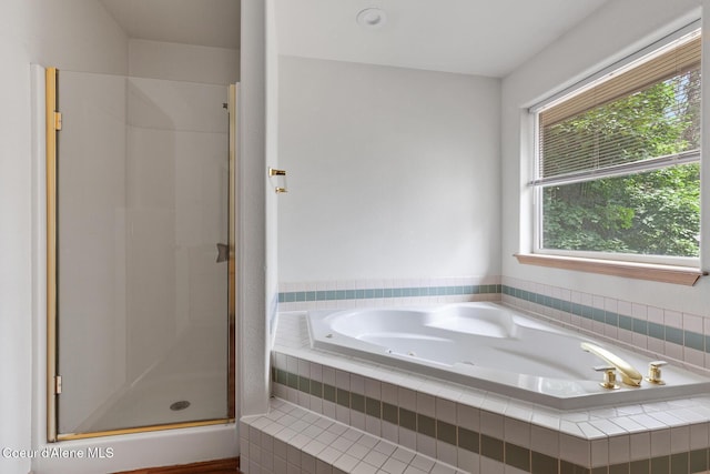 3868 N Palmer Dr, Coeur Dalene, ID 83815 - full bathroom with a stall shower and a tub with jets