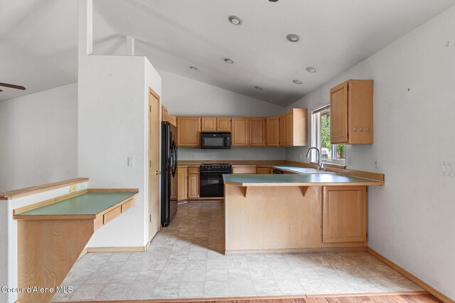3868 N Palmer Dr, Coeur Dalene, ID 83815 - kitchen featuring black appliances, vaulted ceiling, a peninsula, a breakfast bar area, and light countertops