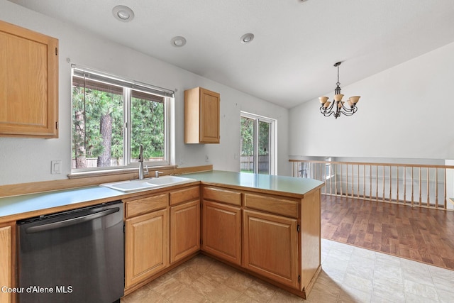 3868 N Palmer Dr, Coeur Dalene, ID 83815 - kitchen with dishwasher, lofted ceiling, a chandelier, light countertops, and a peninsula