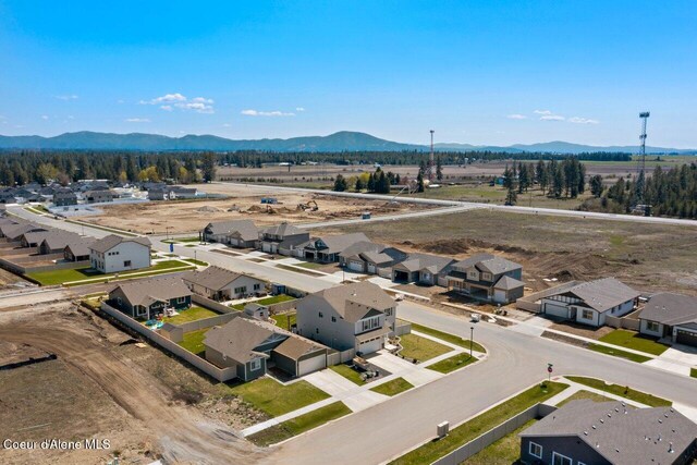aerial view featuring a residential view and a mountain view