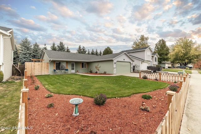 ranch-style house featuring a front lawn, a garage, concrete driveway, and fence