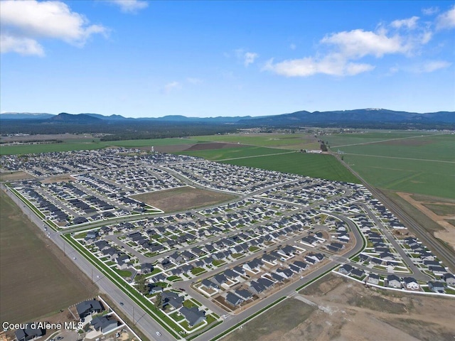 drone / aerial view featuring a mountain view