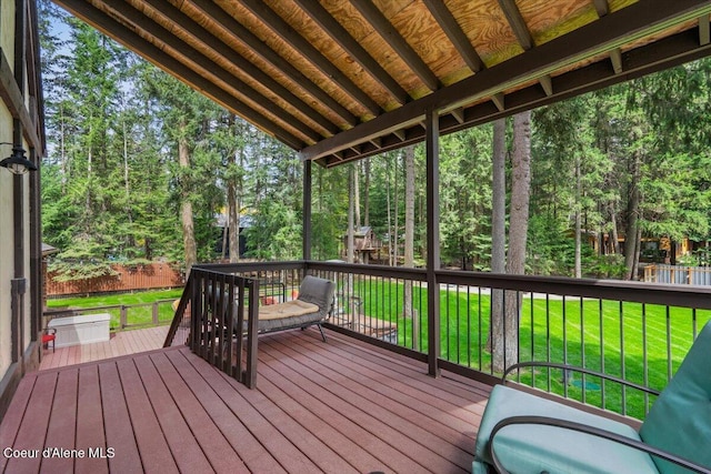 deck featuring a lawn