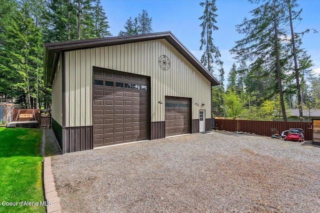 detached garage with fence