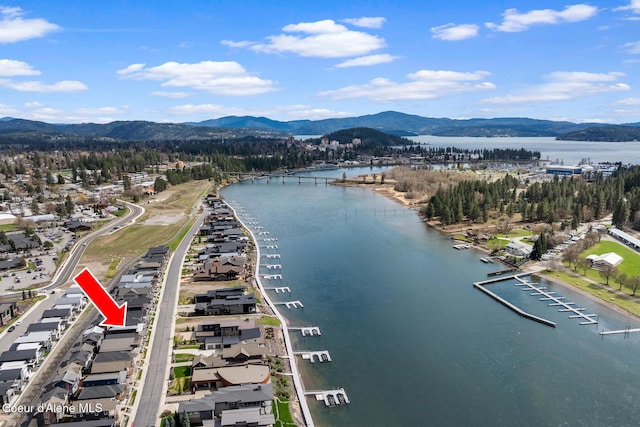aerial view with a water and mountain view