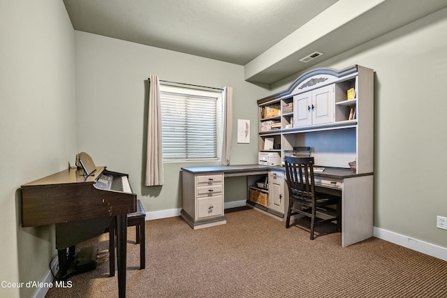 office space with baseboards, dark colored carpet, and visible vents