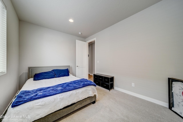 bedroom featuring carpet floors, recessed lighting, and baseboards