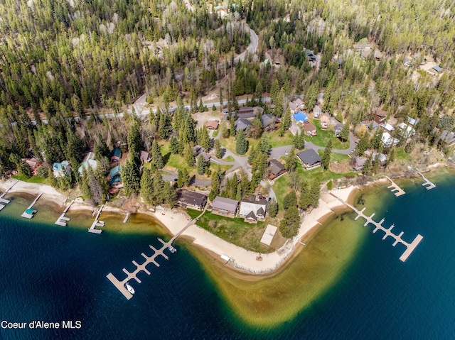 aerial view with a residential view and a water view