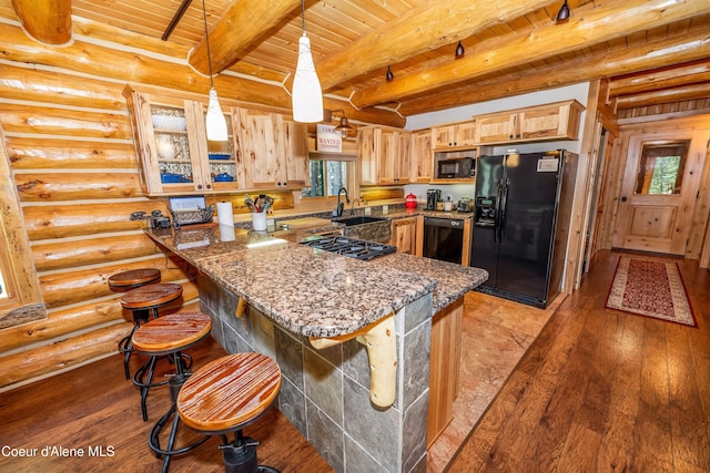kitchen with light stone counters, light wood-style floors, a peninsula, wood ceiling, and black appliances