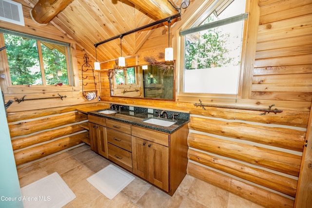 bathroom with a sink, double vanity, wooden ceiling, vaulted ceiling with beams, and visible vents