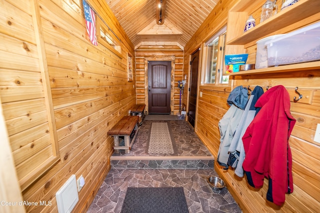 doorway to outside featuring rustic walls, wood walls, wood ceiling, and lofted ceiling