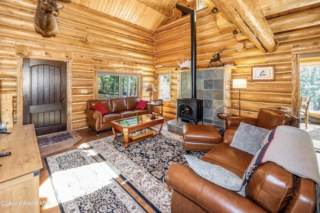 living room featuring a wood stove, wood finished floors, wooden ceiling, rustic walls, and vaulted ceiling with beams