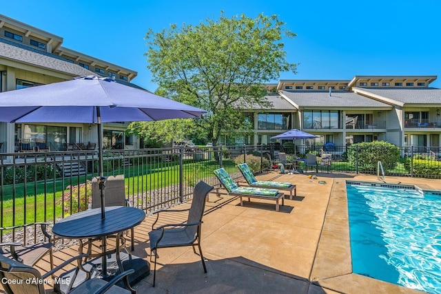 exterior space with a patio area and fence