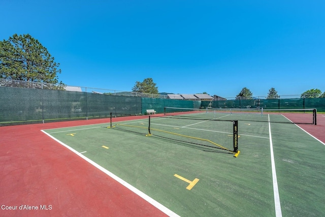 view of sport court featuring fence and community basketball court