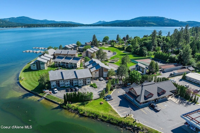 aerial view featuring a water and mountain view