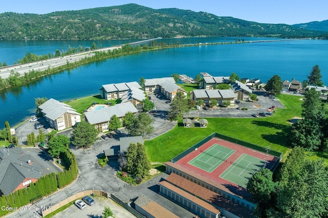 bird's eye view with a water and mountain view