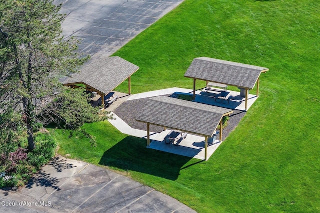 exterior space featuring a gazebo and a yard