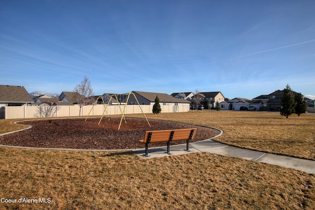1733 N Minam Loop, Post Falls, ID 83854 - view of home's community featuring a residential view, playground community, a yard, and fence