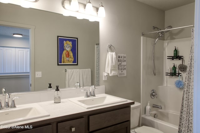 1733 N Minam Loop, Post Falls, ID 83854 - bathroom with shower / tub combo, toilet, double vanity, and a sink