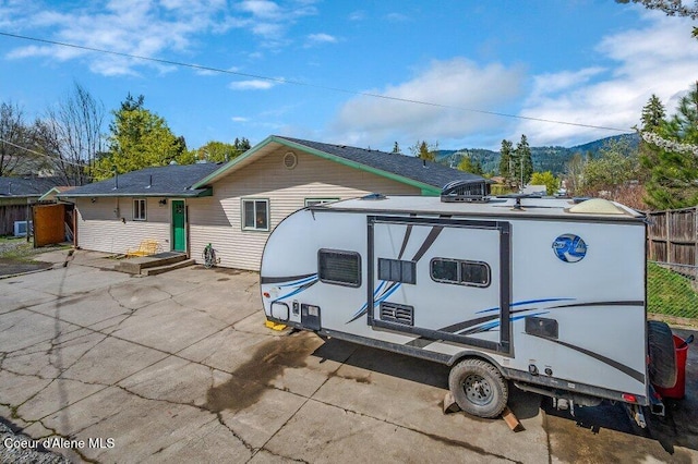 820 Plum Ln, Saint Maries, ID 83861 - exterior space featuring fence and a mountain view