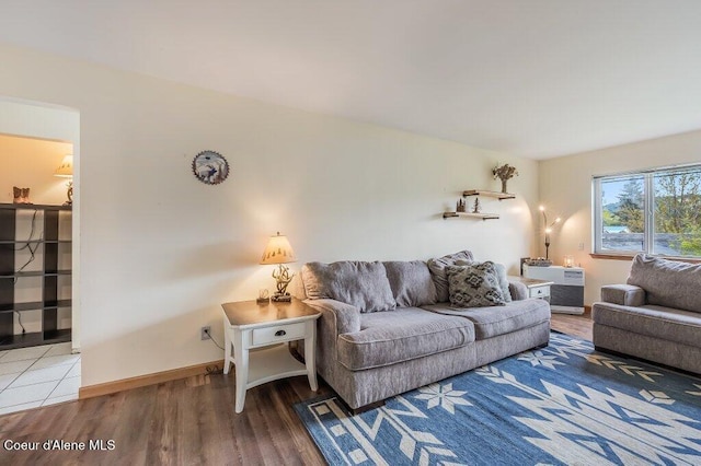 820 Plum Ln, Saint Maries, ID 83861 - living room featuring baseboards and wood finished floors
