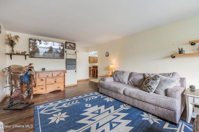 820 Plum Ln, Saint Maries, ID 83861 - living area featuring baseboards and wood finished floors