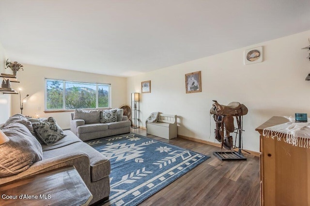 820 Plum Ln, Saint Maries, ID 83861 - living room featuring baseboards and wood finished floors