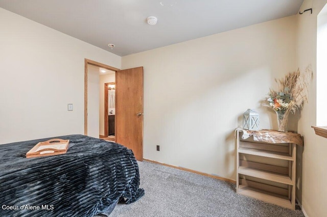 820 Plum Ln, Saint Maries, ID 83861 - carpeted bedroom featuring baseboards