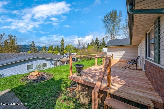 820 Plum Ln, Saint Maries, ID 83861 - view of yard with a fire pit and a wooden deck