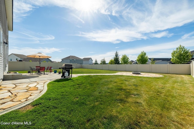 1622 N Minam Loop, Post Falls, ID 83854 - view of yard with an outdoor fire pit and a patio area