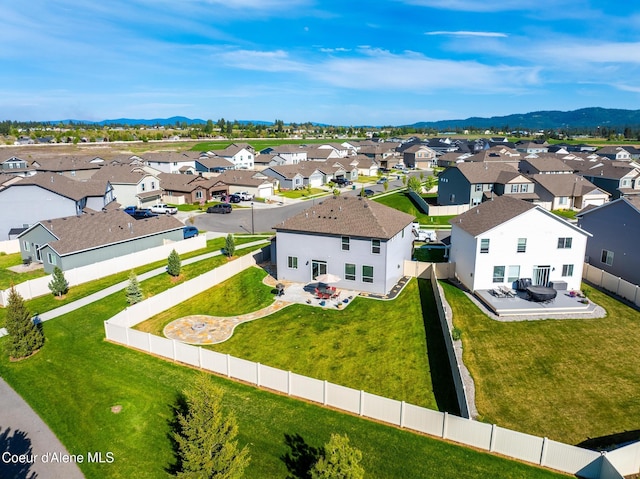 1622 N Minam Loop, Post Falls, ID 83854 - aerial perspective of suburban area featuring a mountain backdrop