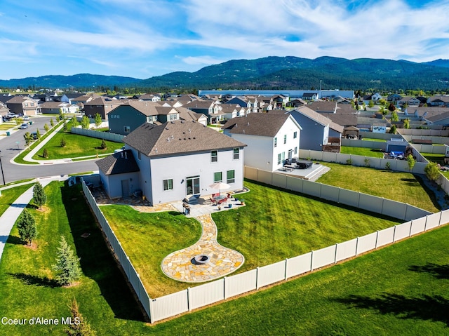1622 N Minam Loop, Post Falls, ID 83854 - aerial perspective of suburban area with a mountainous background