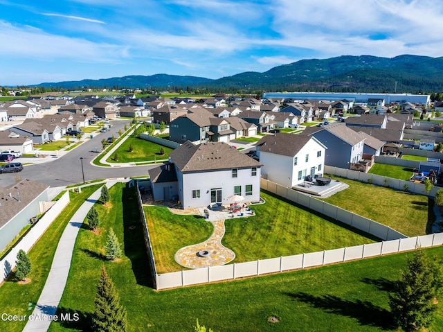 1622 N Minam Loop, Post Falls, ID 83854 - aerial perspective of suburban area featuring mountains