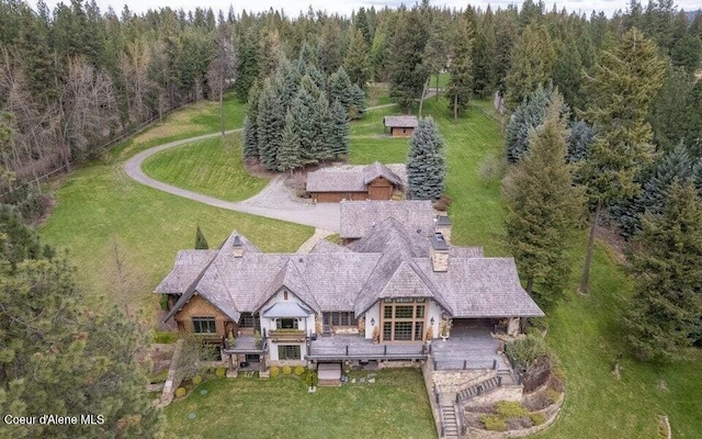 7566 E Gem Shores Rd, Hayden, ID 83835 - birds eye view of property with a forest view