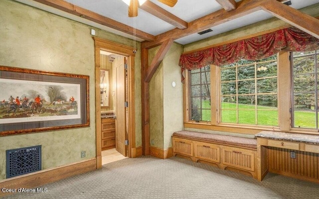 7566 E Gem Shores Rd, Hayden, ID 83835 - interior space with a textured wall, light colored carpet, beam ceiling, a ceiling fan, and visible vents