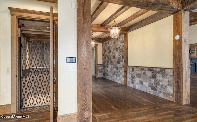 7566 E Gem Shores Rd, Hayden, ID 83835 - interior space featuring beamed ceiling, wood-type flooring, and a chandelier