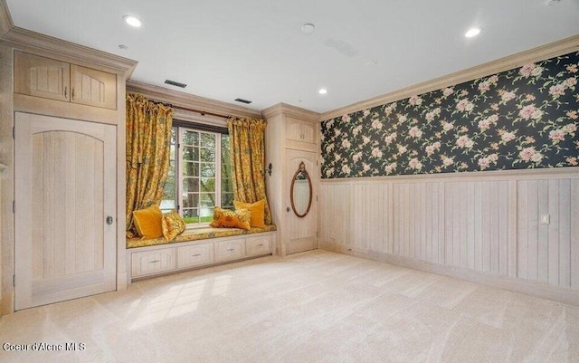 7566 E Gem Shores Rd, Hayden, ID 83835 - carpeted empty room with visible vents, ornamental molding, wainscoting, wallpapered walls, and recessed lighting