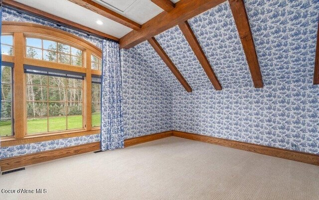 7566 E Gem Shores Rd, Hayden, ID 83835 - interior space with visible vents, beam ceiling, and a wealth of natural light