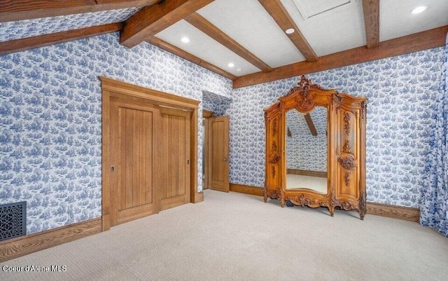 7566 E Gem Shores Rd, Hayden, ID 83835 - additional living space with visible vents, wallpapered walls, light carpet, and beamed ceiling